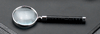 magnifying lens with black croco-grain handle and chrome-plated brass fittings